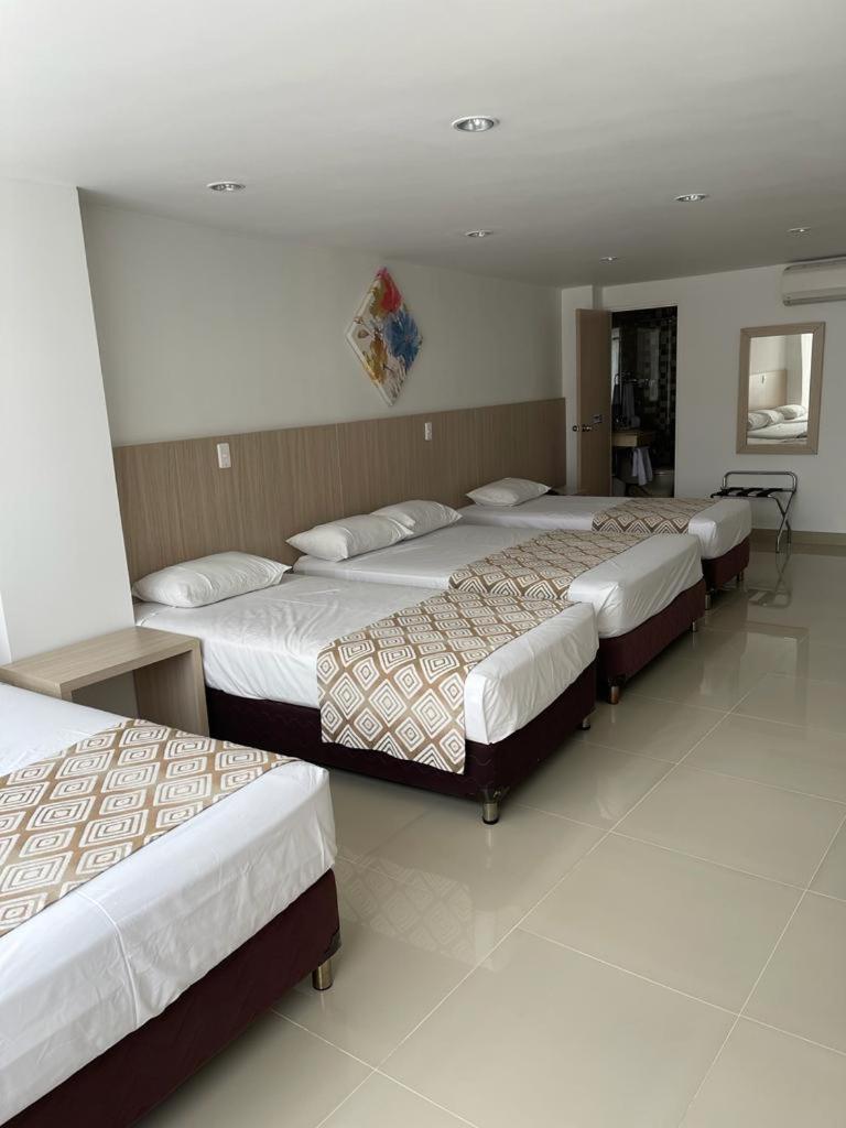 Hotel Juan Maria Tulua Bagian luar foto