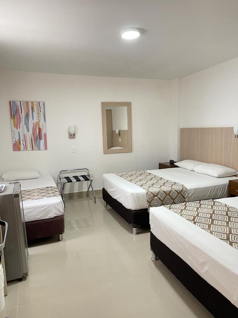 Hotel Juan Maria Tulua Bagian luar foto