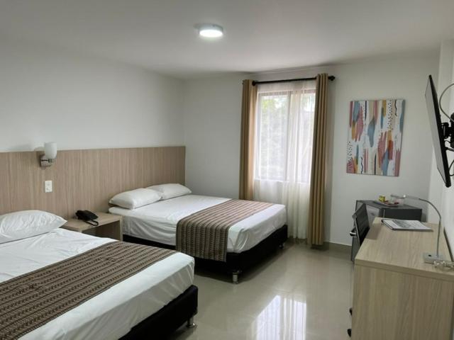 Hotel Juan Maria Tulua Bagian luar foto
