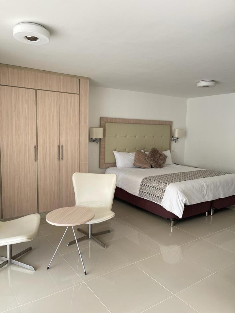 Hotel Juan Maria Tulua Bagian luar foto